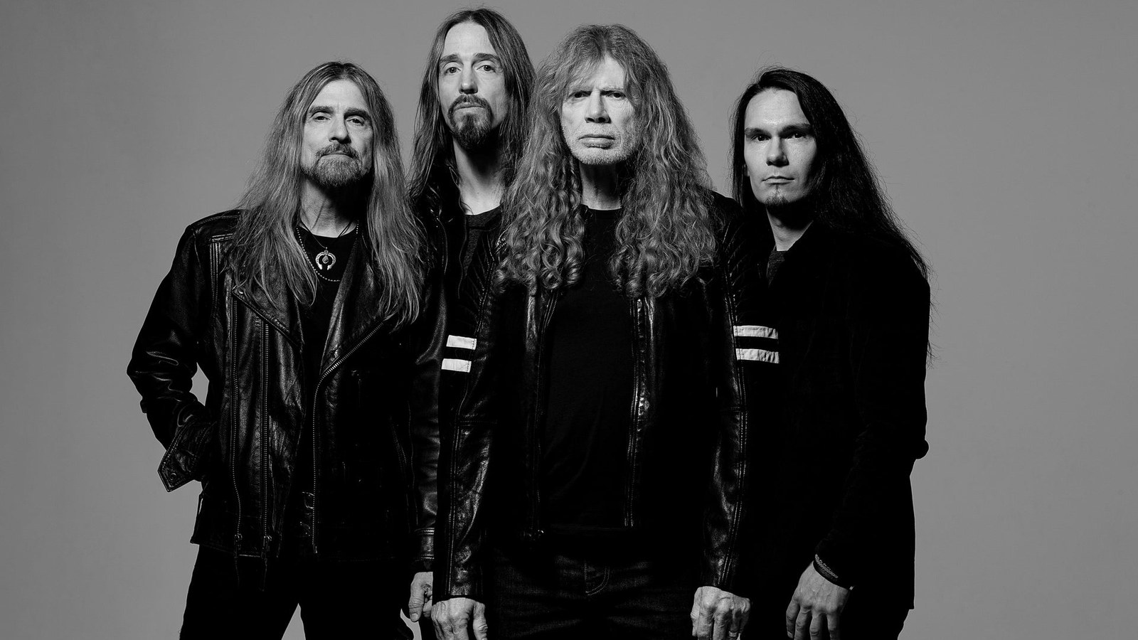 De fire medlemmene i Megadeth fotografert sammen i svart-hvitt